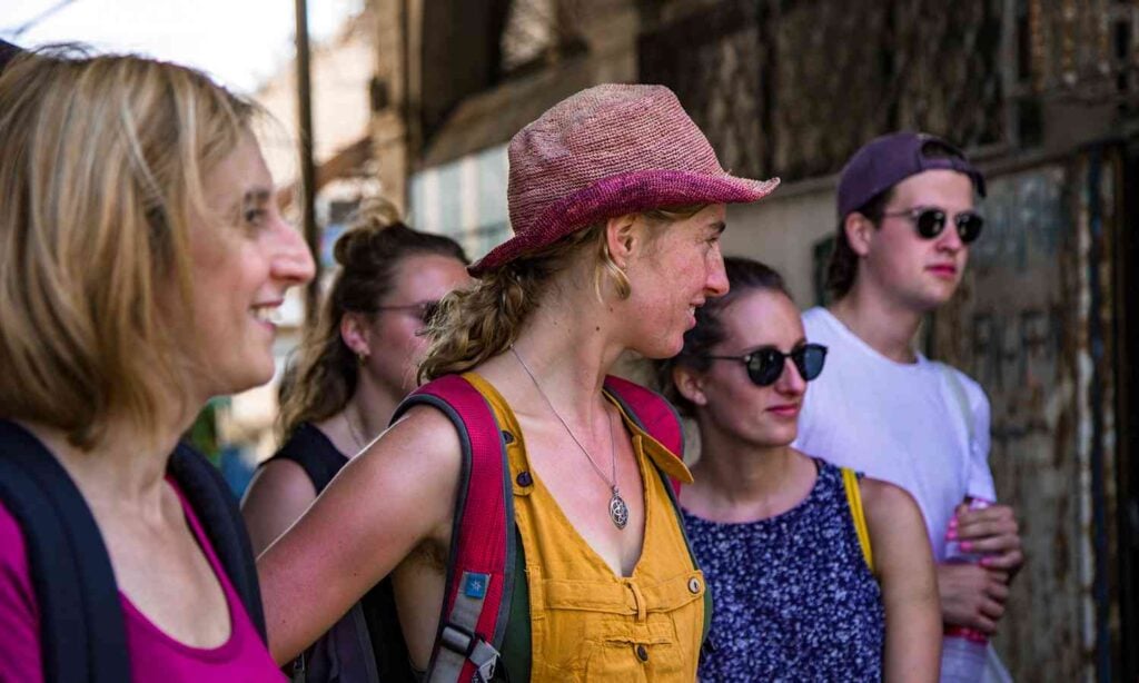 Group of travelers exploring Tel Aviv on a walking tour